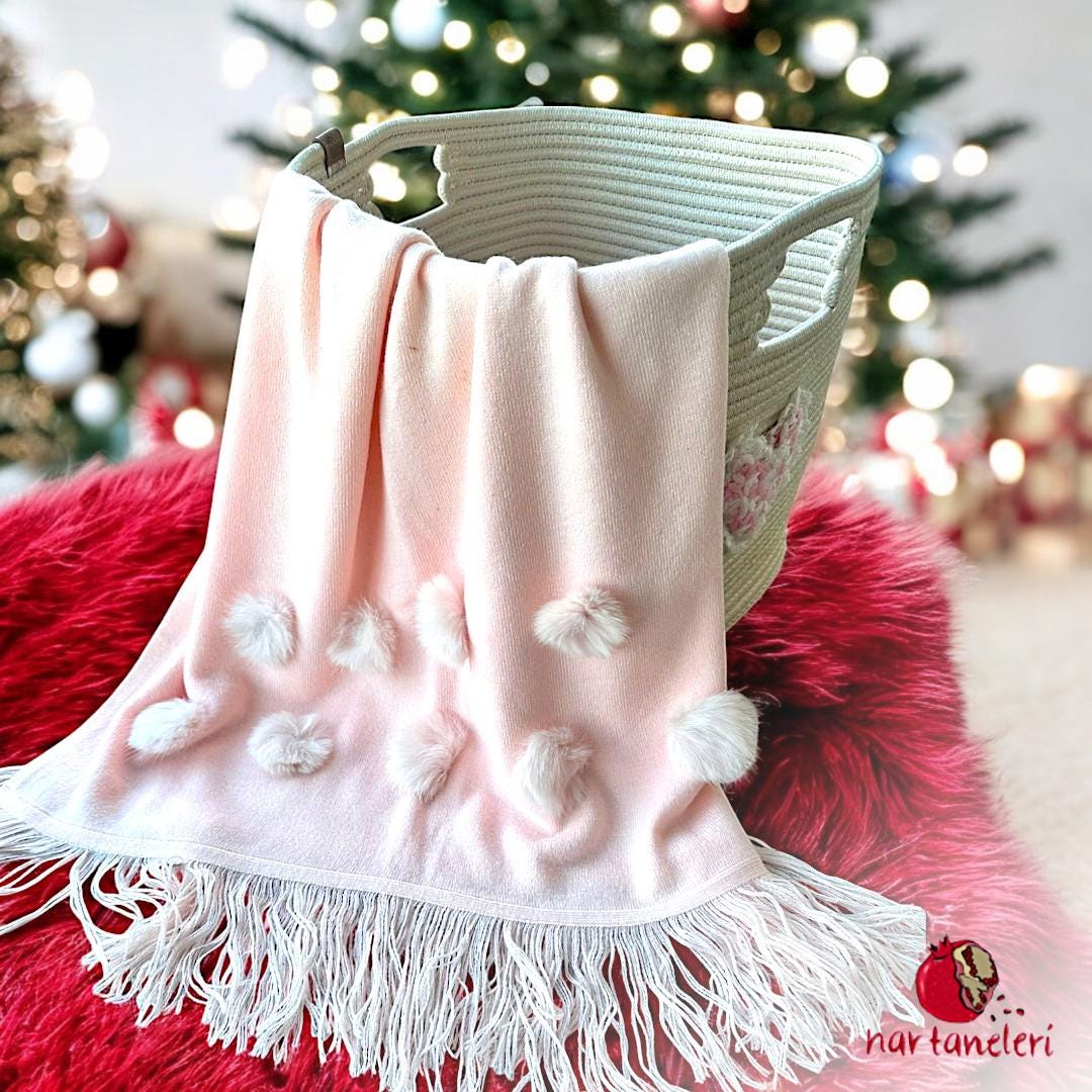 Elegant Touch of Pink: Heart Patterned Basket and Soft Polar Blanket