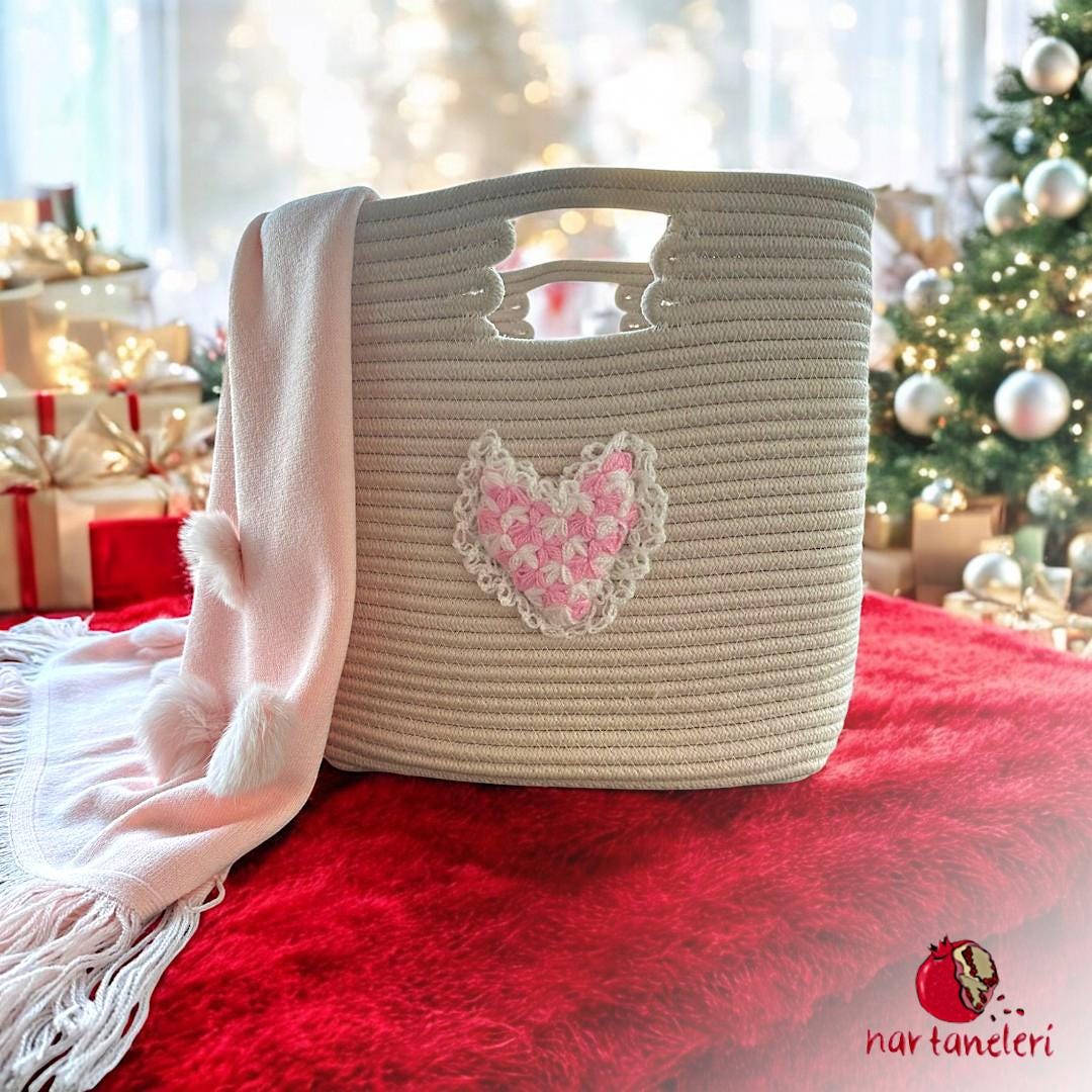 Elegant Touch of Pink: Heart Patterned Basket and Soft Polar Blanket